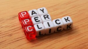A set of dices endorsing small businesses can leverage PPC campaigns for sales growth